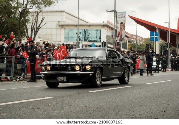 Istanbul, Turkey - October 29, 2021:\
Front view of a black 1965 Ford Mustang GT 350 classic car on\
October 29 republic day of Turkey, Classic car parade\
moment.