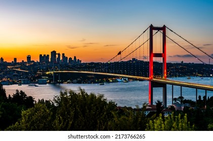 ISTANBUL, TURKEY. Panoramic view of Istanbul Bosphorus on sunset. Istanbul Bosphorus Bridge (15 July Martyrs Bridge. Turkish: 15 Temmuz Sehitler Koprusu). Beautiful cloudy blue sky. - Powered by Shutterstock