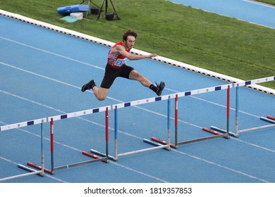 ISTANBUL, TURKEY - SEPTEMBER 12, 2020: Undefined Athlete Running 400 Metres Hurdles During Balkan U20 Athletics Championships