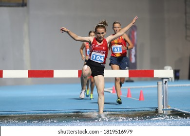 ISTANBUL, TURKEY - SEPTEMBER 12, 2020: Athletes Running 3000 Metres Steeplechase During Balkan U20 Athletics Championships