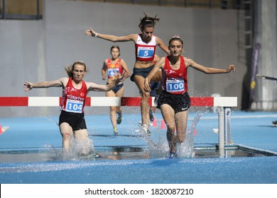 ISTANBUL, TURKEY - SEPTEMBER 12, 2020: Athletes Running 3000 Metres Steeplechase During Balkan U20 Athletics Championships