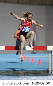 ISTANBUL, TURKEY - SEPTEMBER 12, 2020: Athletes Running 3000 Metres Steeplechase During Balkan U20 Athletics Championships