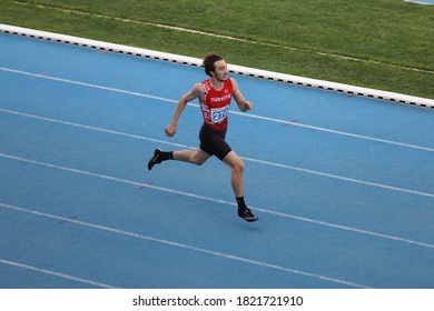 ISTANBUL, TURKEY - SEPTEMBER 12, 2020: Undefined athlete running during Balkan U20 Athletics Championships - Shutterstock ID 1821721910