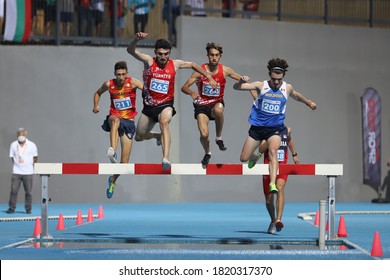 ISTANBUL, TURKEY - SEPTEMBER 13, 2020: Athletes Running 3000 Metres Steeplechase During Balkan U20 Athletics Championships