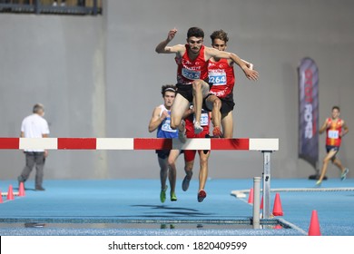 ISTANBUL, TURKEY - SEPTEMBER 13, 2020: Athletes Running 3000 Metres Steeplechase During Balkan U20 Athletics Championships