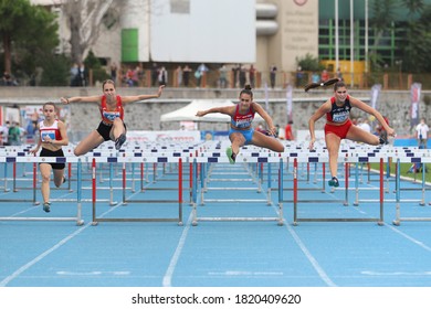 ISTANBUL, TURKEY - SEPTEMBER 13, 2020: Athletes Running 100 Metres Hurdles During Balkan U20 Athletics Championships