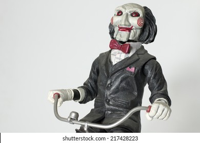 Istanbul, Turkey - September 14, 2014: Jigsaw's little puppet. Saw is a horror film franchise distributed by Lions Gate and produced by Twisted Pictures that consists films and additional merchandise.