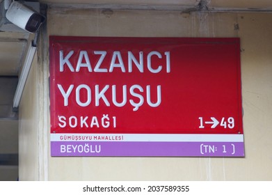 Istanbul Turkey September 6, 2021, Sign board of Kazanci Yokusu Street,( Kazancı Yokuşu ) located at Beyoglu district close to Taksim square, street name red metal board on wall, Turkish 