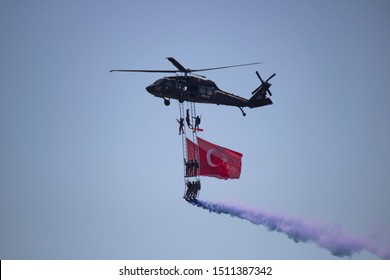 Istanbul, Turkey - September-18,2019: Soldier Doing Demonstration Flight Under Helicopter. Turkish Land Forces.