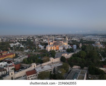 Istanbul, Turkey. Sultanahmet With The Blue Mosque And The Hagia Sophia With A Golden Horn On The Background At Sunrise. Cinematic Aerial View.