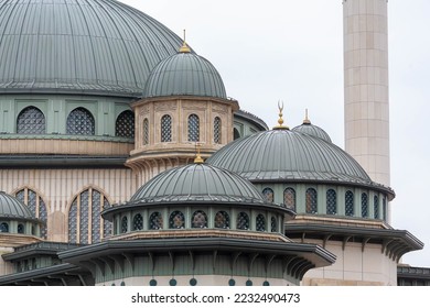 Istanbul, Turkey (Turkiye). Taksim Mosque (Taksim Camii). Mosque complex at Taksim Square at rainy cloudy day. Close up fragment. Isolated on a white background