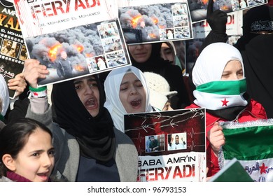 ISTANBUL, TURKEY-MARCH 2: A group of unidentified people stage a demonstration in front of the Beyazit Mosque, protesting Syrian authorities' violent crackdown in Homs, on March 2, 2012 in Istanbul,Turkey