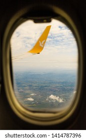 Istanbul, Turkey-may 04, 2019: International Airport Sabiha Gökçen International Airport,yellow Wing Passenger Aircraft In Flight In The Clouds, Pegasus Airline, Logo With A Horse