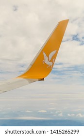 Istanbul, Turkey-may 04, 2019: International Airport Sabiha Gökçen International Airport,yellow Wing Passenger Aircraft In Flight In The Clouds, Pegasus Airline, Logo With A Horse