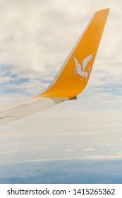 Istanbul, Turkey-may 04, 2019: International Airport Sabiha Gökçen International Airport,yellow Wing Passenger Aircraft In Flight In The Clouds, Pegasus Airline, Logo With A Horse