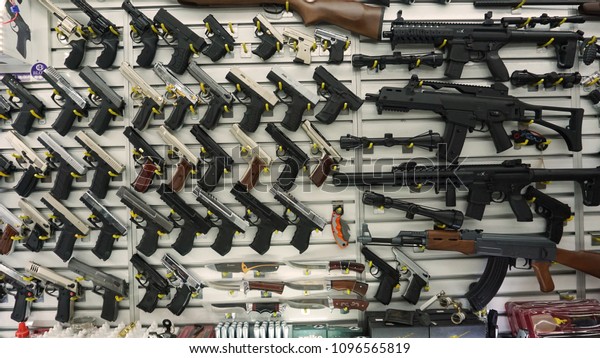 ISTANBUL/TURKEY, \
May 2018: Showcase of a gun shop in Istanbul at a weapons store on\
the Galata Bridge.                  \
