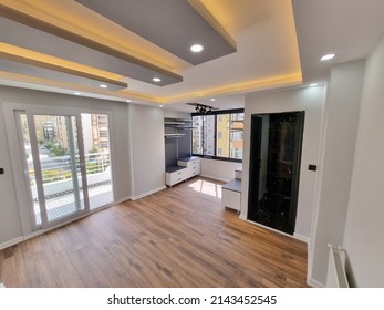 Istanbul,turkey-april 7 2022:parquet Floor, Yellow Led Lights On Decorative Ceiling, Empty Bedroom