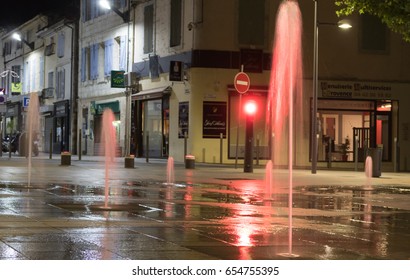 ISTR, FRANCE - MAY 31 2017. Allée Jean Jaurès At Night. Fountain In The Street.