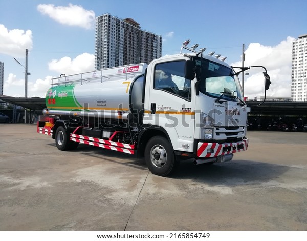Isuzu trucks with oil tank\
installation in the parking lot - Thailand Chiang Mai November 1,\
2021