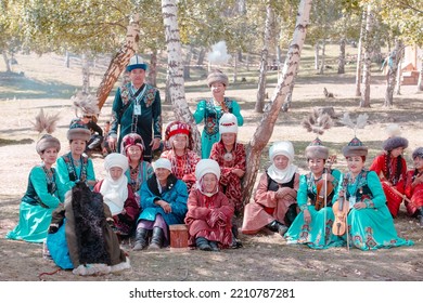 Isyk-Kul, Kyrgyzstan - September ‎29, ‎2018: Kyrgyz Family In National Dress During World Nomad Games