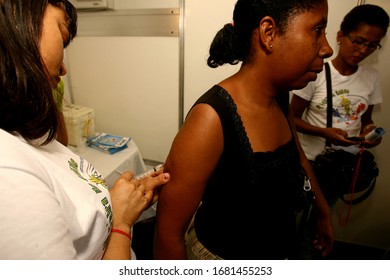 Itabuna, Bahia / Brazil - November 30, 2011: Person Is Seen Having Yellow Fever Vaccine During Health Fair In The City Of Itabuna. 