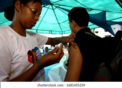 Itabuna, Bahia / Brazil - November 30, 2011: Person Is Seen Having Yellow Fever Vaccine During Health Fair In The City Of Itabuna. 