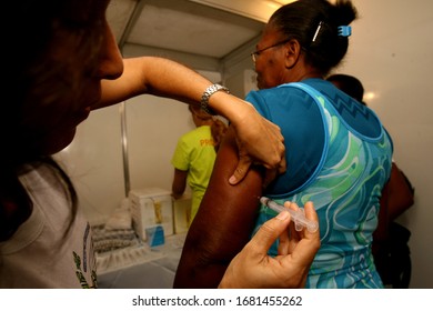 Itabuna, Bahia / Brazil - November 30, 2011: Person Is Seen Having Yellow Fever Vaccine During Health Fair In The City Of Itabuna. 