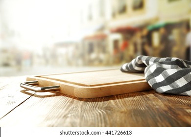 Italian Background Of Street And Kitchen Desk And Blue Napkin And Free Space 