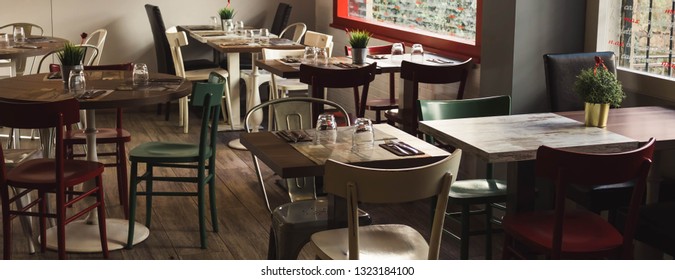 Italian Bar Interior With Tables And Chairs