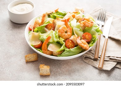 Italian Caesar Salad With Shrimp, Croutons And Parmesan, Selective Focus