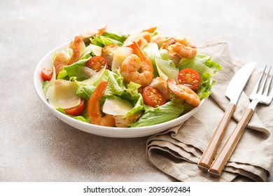 Italian Caesar Salad With Shrimp, Croutons And Parmesan, Selective Focus