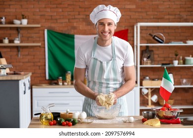 Italian chef making dough in kitchen