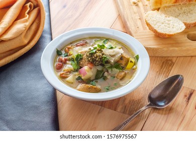 Italian Chicken Sausage Minestrone Soup Au Pistou Topped With Basil Pesto And Grated Parmesan Cheese