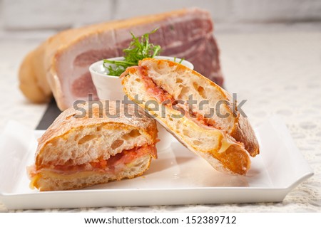 Similar – Image, Stock Photo Bread buns in a basket hanging on a blue wall