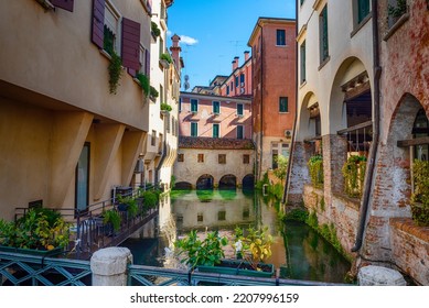 The Italian city of Treviso in the province of Veneto. View of the river Sile and the architecture of the city of Treviso Italy. Venetian architecture in Treviso, Italy.