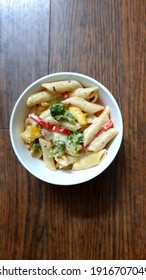 Italian Cream Pasta With Brocolli, Red And Yellow Peppers