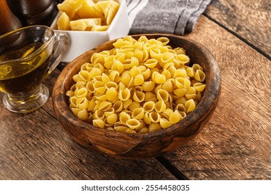 Italian cuisine - dry conchiglie shell pasta - Powered by Shutterstock