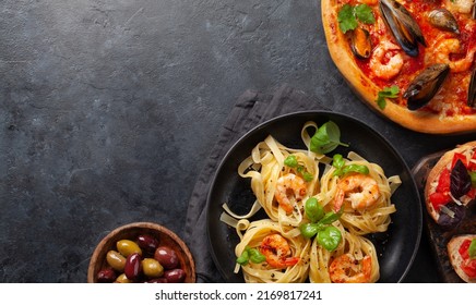 Italian Cuisine. Pasta, Pizza, Olives And Antipasto Toasts. Flat Lay With Copy Space