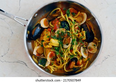 Italian Delicacy Food, Seafood Linguine Pasta With Shrimps, Clams, Mussels, Squid And Scallops