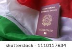 Italian European Passport on Italy Country Flag: Citizenship Proof at Customs with Copyspace