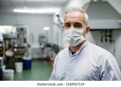 Italian European Worker Working In Food Factory Portrait Waring Face Mask For Hygiene 