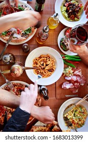 Italian Family Meal In A Restaurant