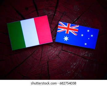 Italian Flag With Australian Flag On A Tree Stump Isolated