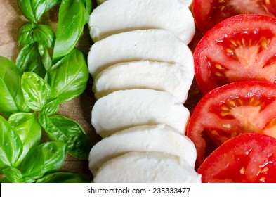 italian flag made of  food concept. Italian tasty food. italian caprese salad made of mozzarella, basil and tomatoes.
