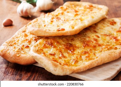 Italian Focaccia Bread With Rosemary, Garlic, Sea Salt, Olive Oil And Mozzarella