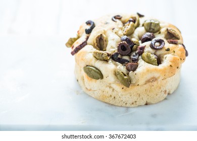 Italian foccacia with green and black olives - Powered by Shutterstock