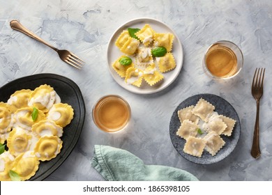 Italian Food. An Assortment Of Various Ravioli, Shot From Above With Glasses Of Wine