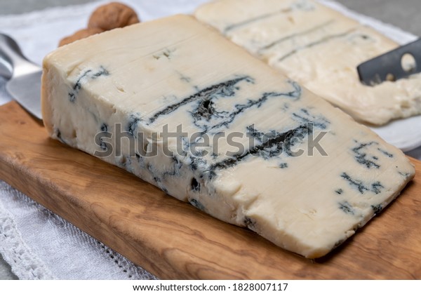 Italian food, buttery or firm blue\
cheese made from cow milk in Gorgonzola, Milan, Italy close\
up