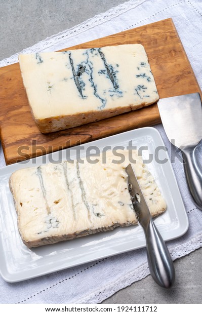 Italian food, buttery or firm blue
cheese made from cow milk in Gorgonzola, Milan, Italy close
up