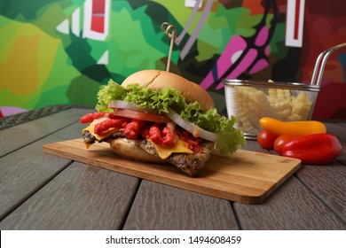 Italian Food Cheetos Chicken Burger With Fries On Wood Table